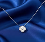 Шигтгээтэй сийлбэртэй мөнгөн зүүлт